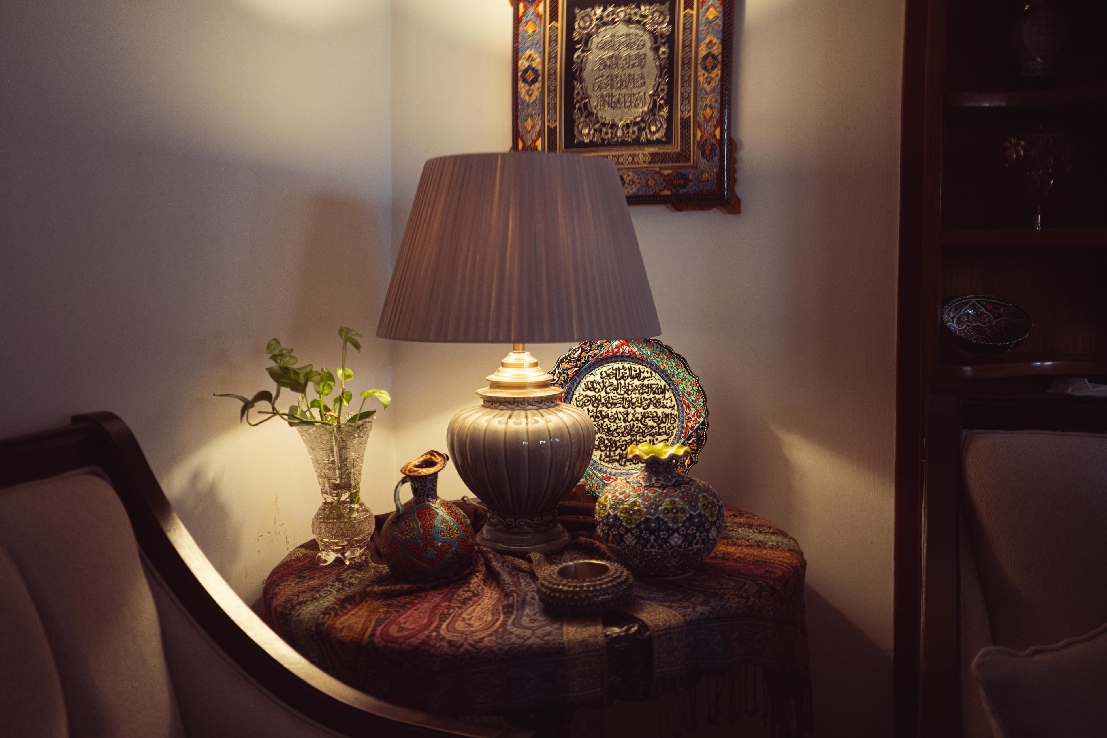 Table lamp glowing warmly in a cozy corner